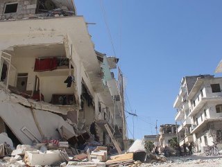 At least 565 civilians killed in Syria