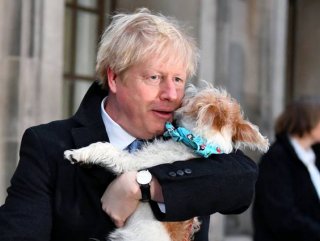 Boris Johnson brings his dog to vote