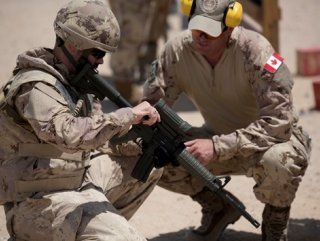 Canada orders its troops to move out of Iraq