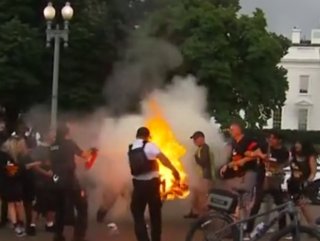 Communist Party members lit American flags on fire