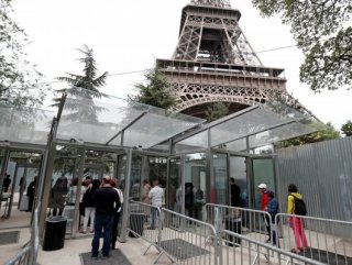 Eiffel Tower is surrounded with bullet-proof glass wall