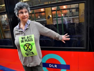 Environmental activists glued to London Stock Exchange