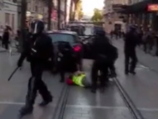 French police beat female Yellow Vest protestor