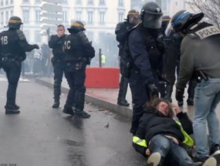 French police brutally drag woman protester to the floor