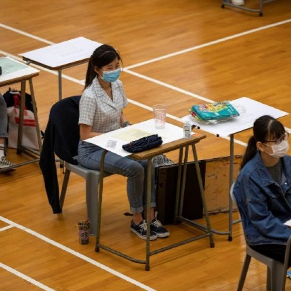 Hong Kong students take final exams after virus delay