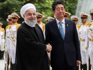 Iran's Rouhani asks Japan PM to support Iranian economy