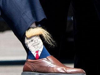 Louisiana’s governor wears hairy Trump socks
