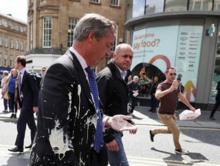 Man charged with throwing a milkshake at UK’s Farage