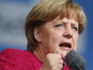 Merkel supports German system for EU leadership race