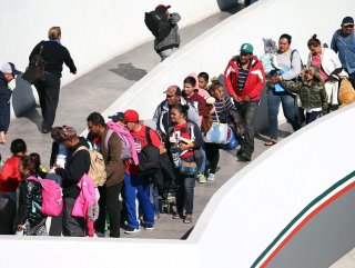 Migrant families sue Trump over asylum ban