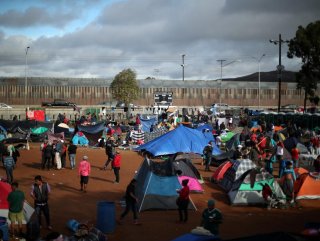 Migrants refuse to leave closed down shelter near US border