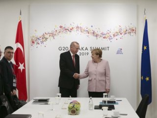 President Erdoğan receives Merkel in Osaka