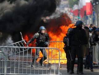 Protesters clash with police after Bastille Day parade