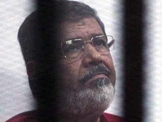 Security forces left Morsi slumped on floor before death, supporters say