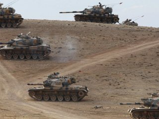 Turkey determined to keep military posts in Syria