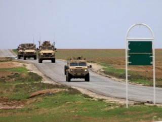 US trucks start to leave Syria after withdrawal signal