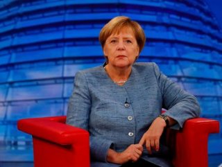 We stick to our commitment to Iran, says Merkel