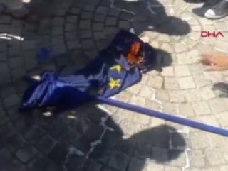 Yellow Vests protesters set EU flag on fire