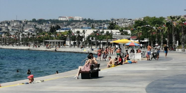 People in Istanbul flock to coastal areas as high temperatures affect daily lives in the megacity.